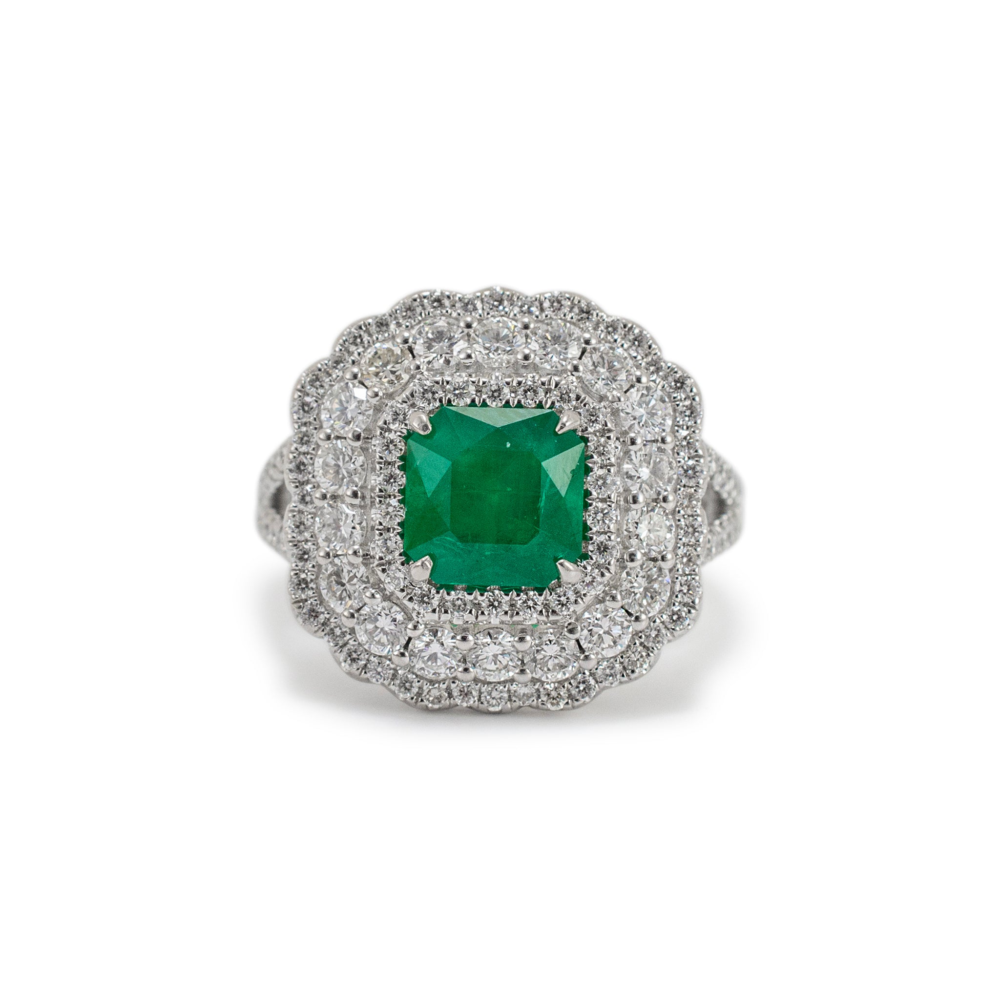 Ladies 18K White Gold Emerald Triple Halo Accented Diamond Cocktail Ring