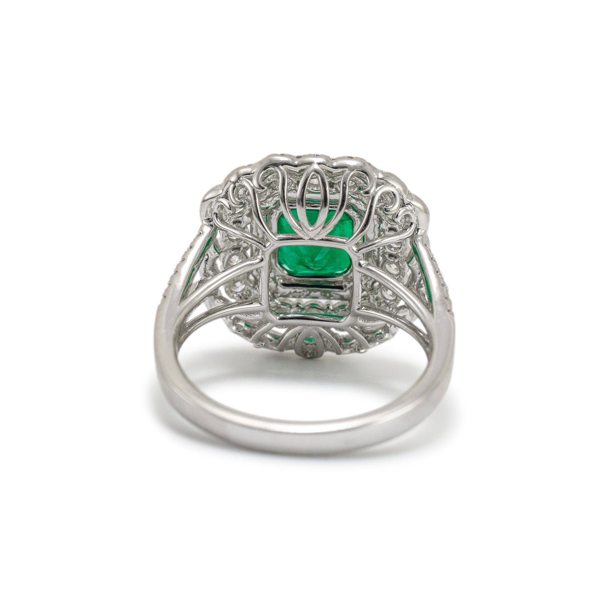 Ladies 18K White Gold Emerald Triple Halo Accented Diamond Cocktail Ring