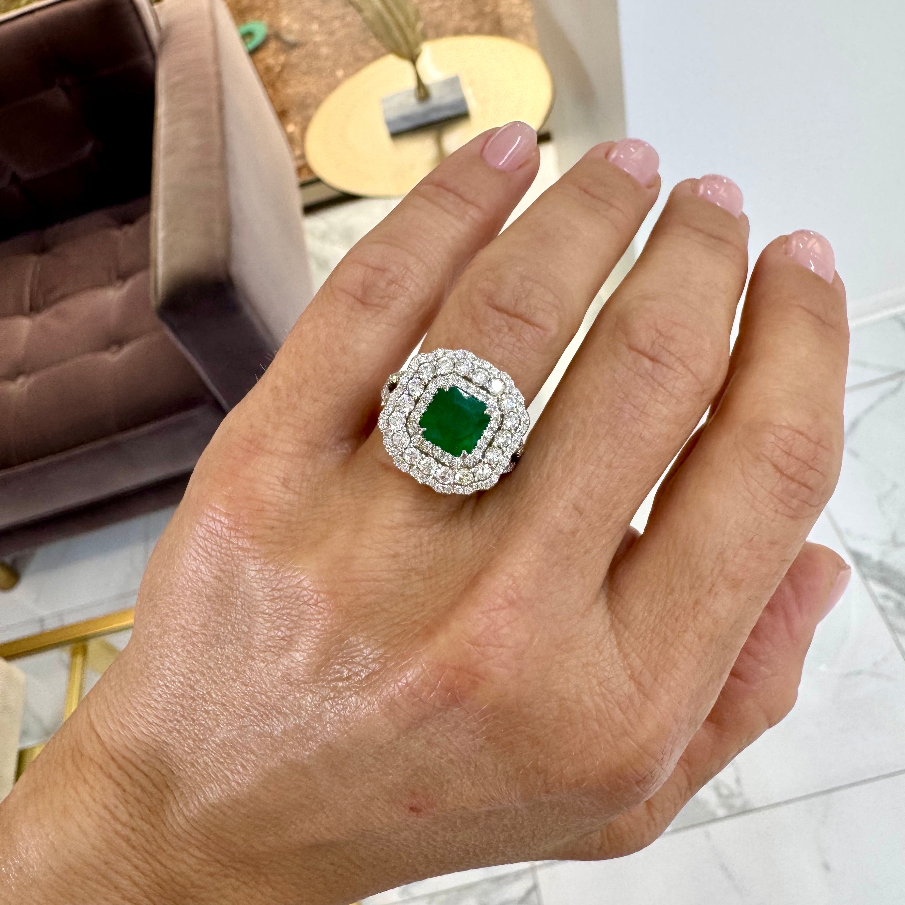 Ladies 18K White Gold Emerald Triple Halo Accented Diamond Cocktail Ring