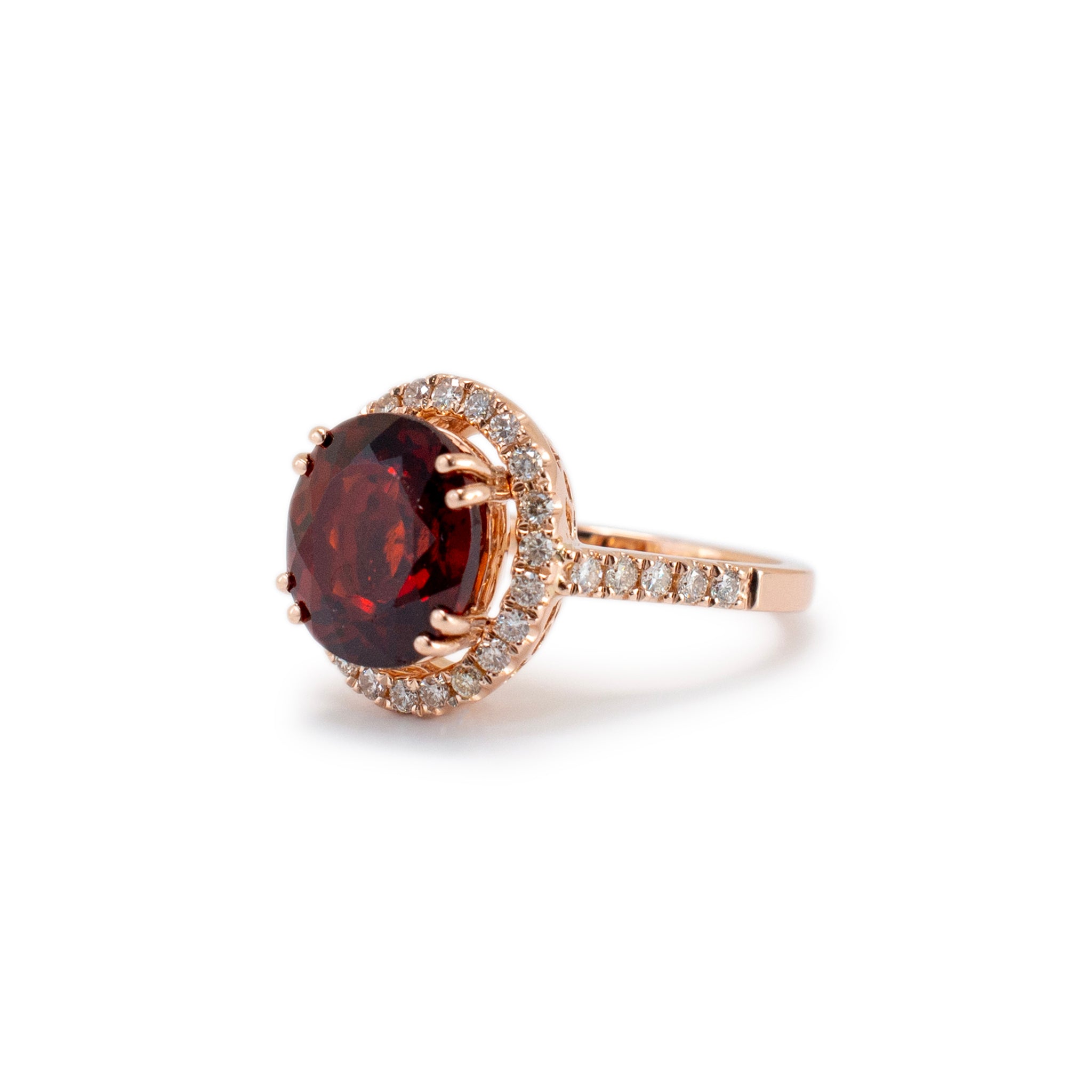 Ladies 14K Rose Gold Garnet Halo Diamond Cocktail Ring