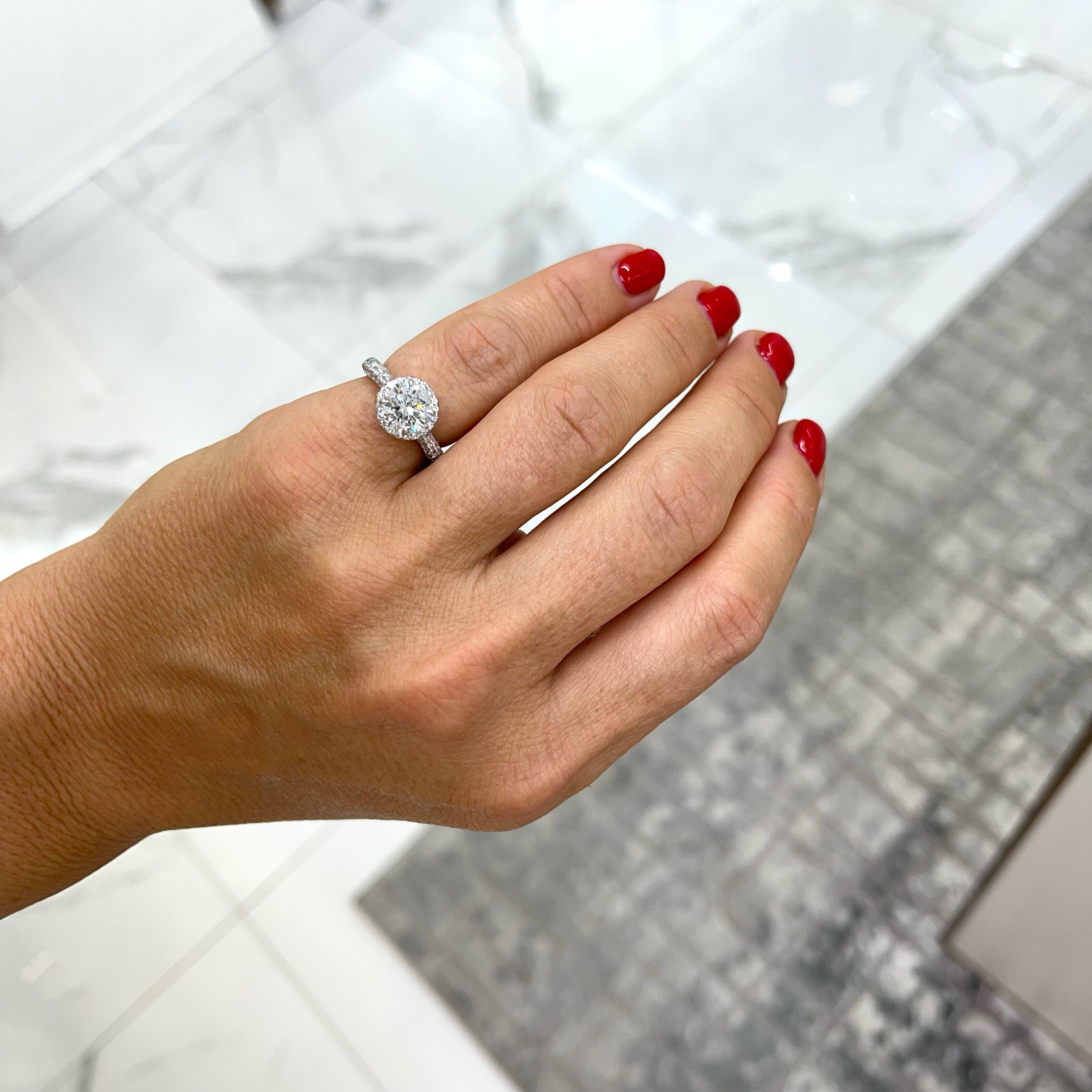 Ladies 18K White Gold Accented Halo Diamond Engagement Ring