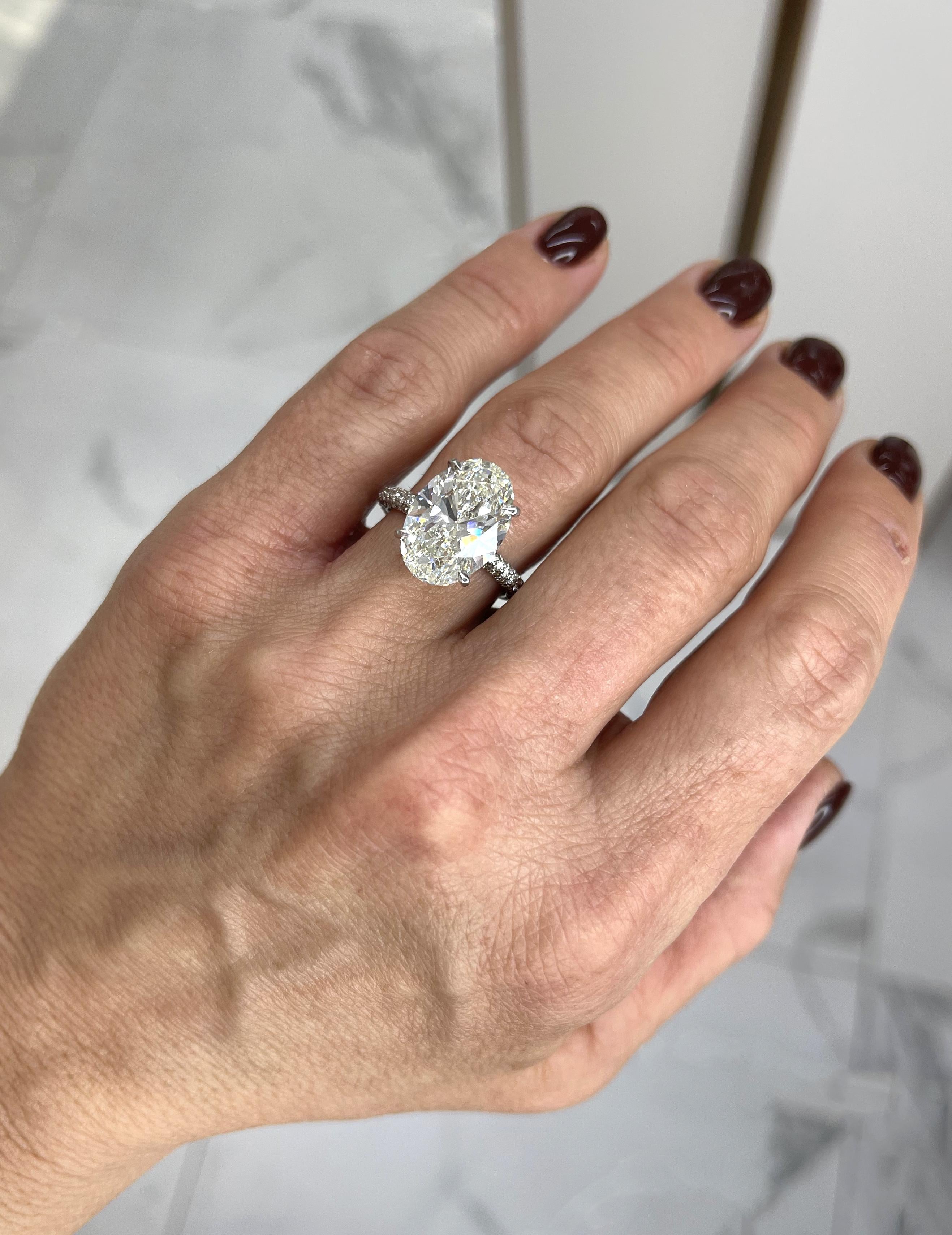 Ladies 18K White Gold IGI 6.50CT I VS1 Oval Lab Grown Diamond Engagement Ring