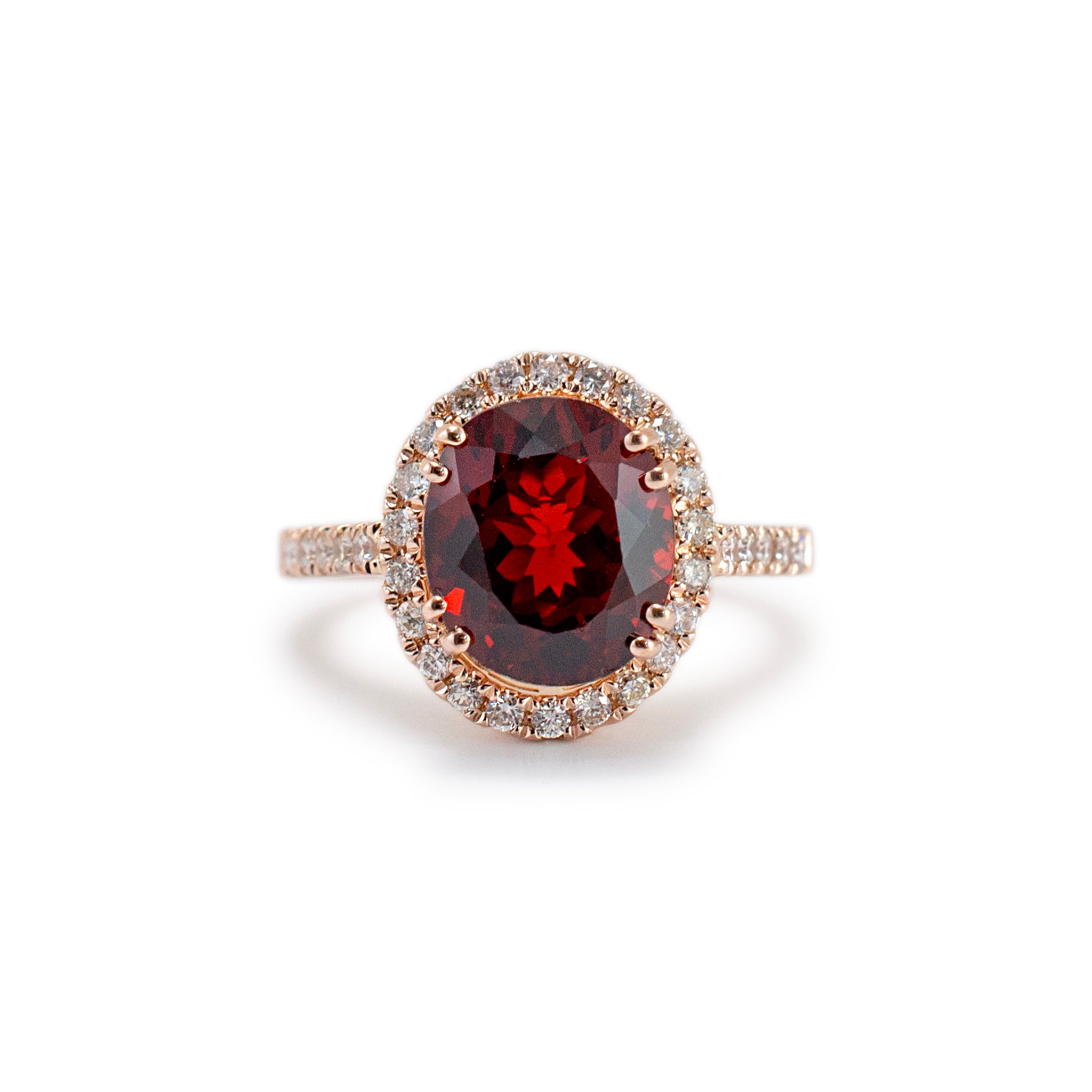 Ladies 14K Rose Gold Garnet Halo Diamond Cocktail Ring