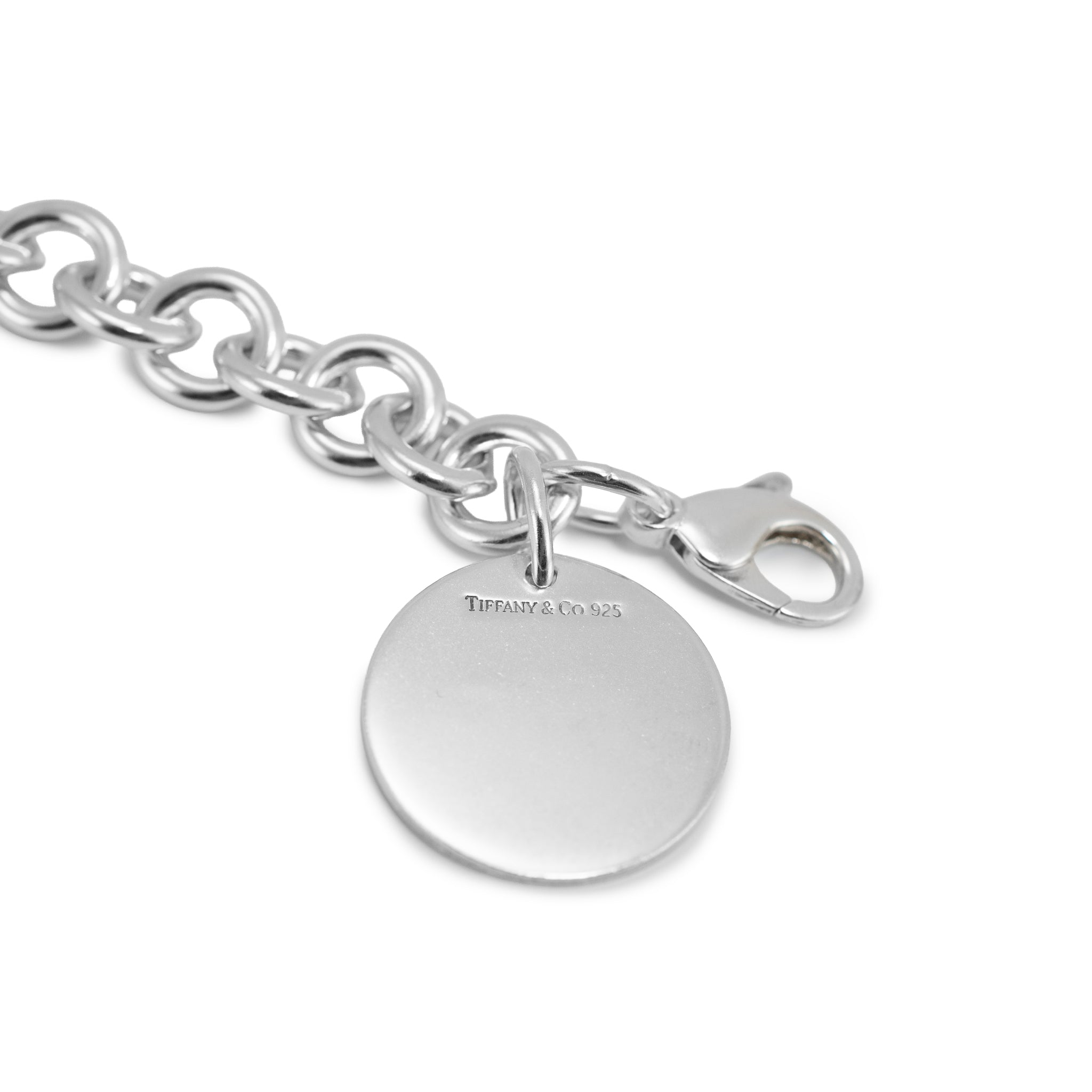 Ladies Tiffany & Co. 925 Sterling Silver Round Tag Charm Rolo Link Bracelet