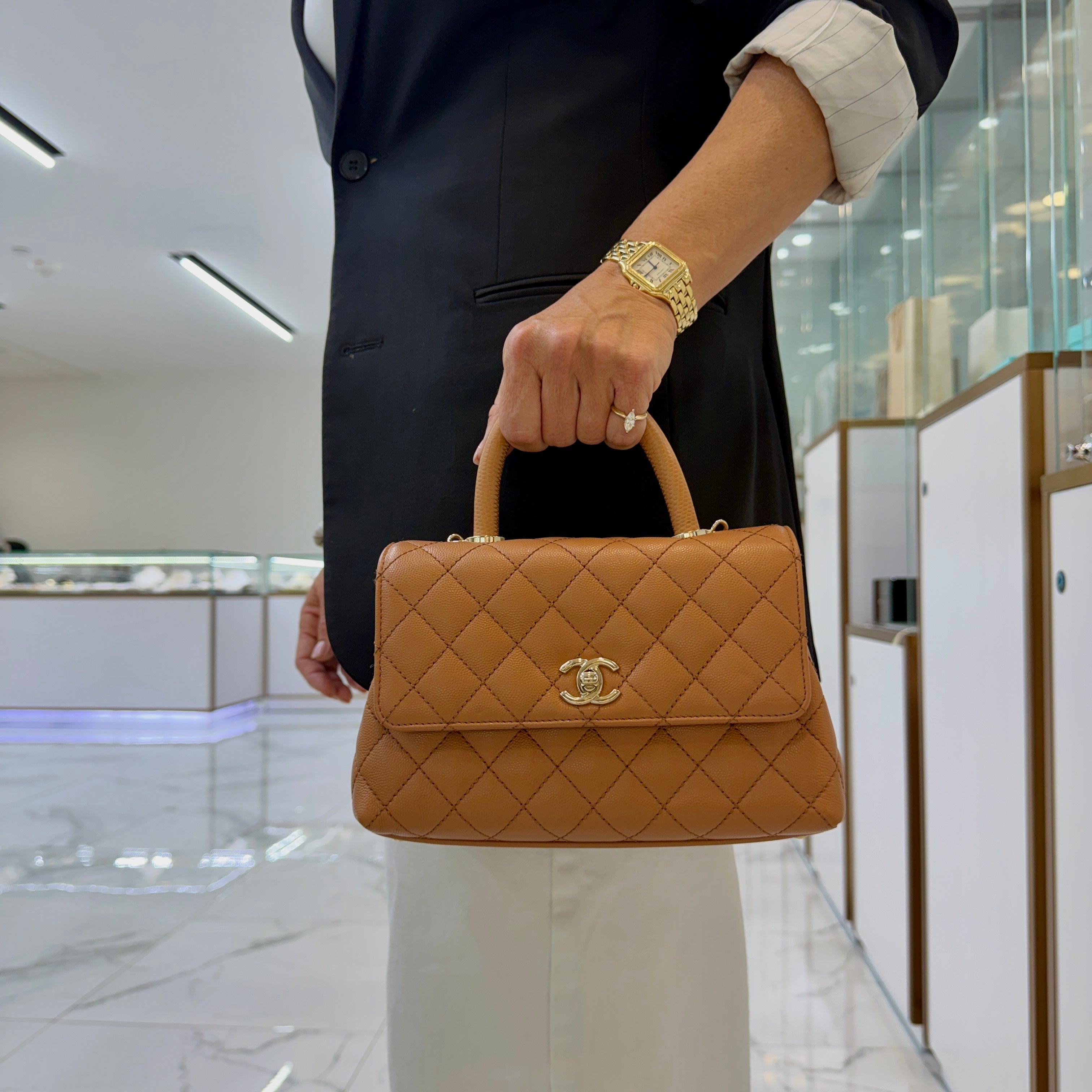 Chanel Coco Caramel Brown Quilted Caviar Leather Mini Flap Top Handle Bag