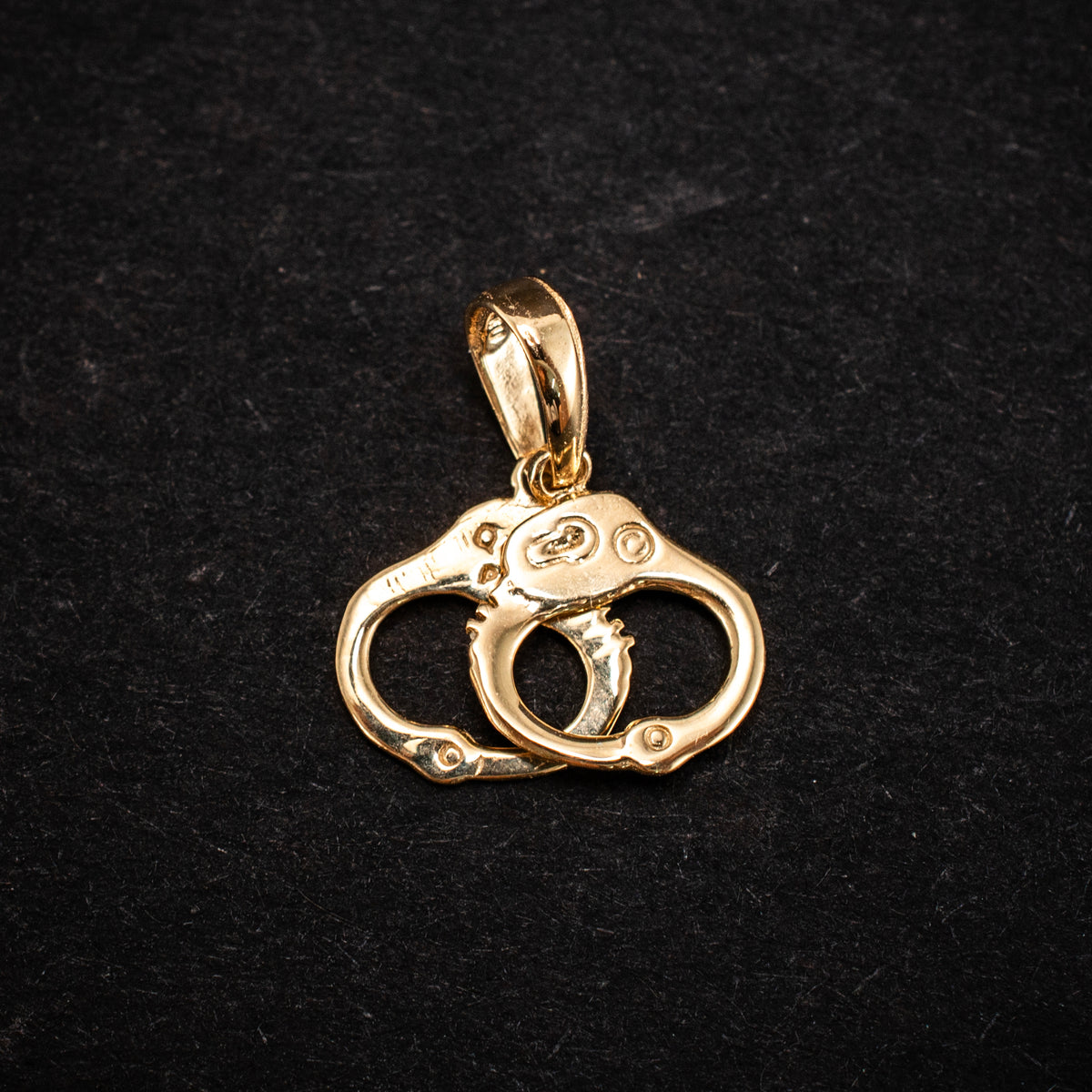 14K Yellow Gold Handcuffs Charm Pendant 0.62g ½" 460110 available at DJP Jewelers & Luxury Buyers