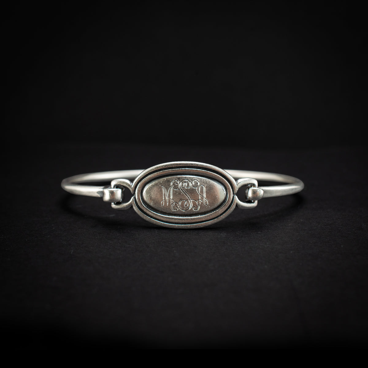 Retired James Avery monogrammed signet latch Sterling Silver Bangle Bracelet 460435 available at DJP Jewelers & Luxury Buyers