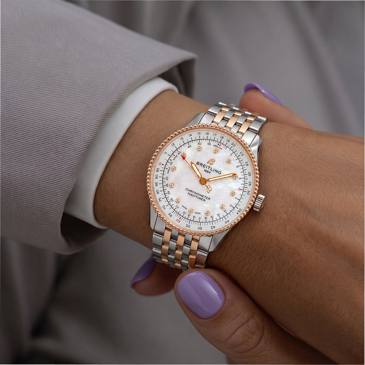 Ladies Breitling Navitimer 35MM U17395 Mop Dial 18K Rose Gold and Steel Watch