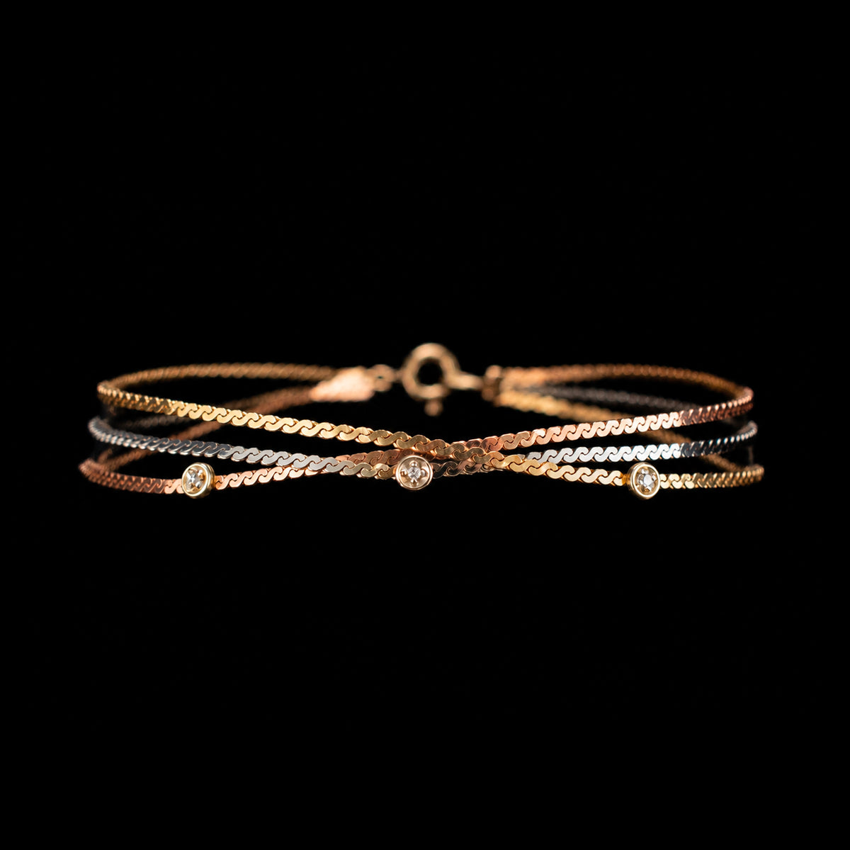 Vintage 14K Tri-Color Gold 0.02ct Diamond Serpentine Bracelet 2.99g 6.5" 469617 available at DJP Jewelers & Luxury Buyers